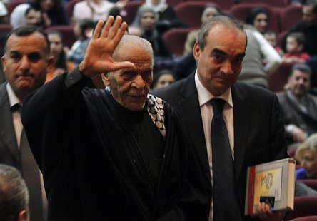 Egyptian poet Ahmed Fouad Negm (2nd R) waves upon his arrival to participate with the Palestinian folk Al Hanouneh troupe in Amman November Egyptian poet Ahmed Fouad Negm (2nd R) waves upon his arrival to participate with the Palestinian folk Al Hanouneh troupe in Amman November