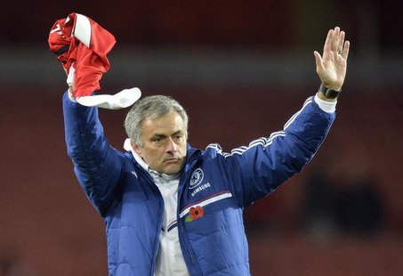 Chelsea's manager Jose Mourinho reacts after their English League Cup fourth round soccer match against Arsenal at Emirates Stadium in Londo Chelsea's manager Jose Mourinho reacts after their English League Cup fourth round soccer match against Arsenal at Emirates Stadium in Londo