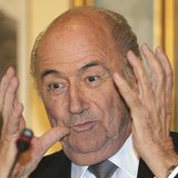 FIFA President Sepp Blatter gestures during a news conference in Doha November 9, 2013. REUTERS/Fadi Al-Assaad FIFA President Sepp Blatter gestures during a news conference in Doha November 9, 2013. REUTERS/Fadi Al-Assaad