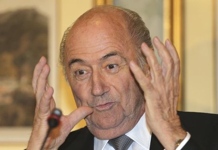 FIFA President Sepp Blatter gestures during a news conference in Doha November 9, 2013. REUTERS/Fadi Al-Assaad FIFA President Sepp Blatter gestures during a news conference in Doha November 9, 2013. REUTERS/Fadi Al-Assaad