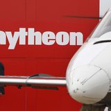 A man walks past the Raytheon exhibition during the Australian International Airshow in Melbourne March 2, 2011. REUTERS/Mick Tsikas A man walks past the Raytheon exhibition during the Australian International Airshow in Melbourne March 2, 2011. REUTERS/Mick Tsikas