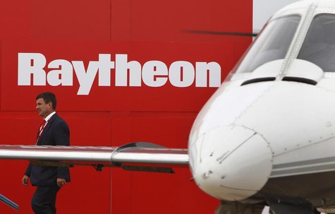 A man walks past the Raytheon exhibition during the Australian International Airshow in Melbourne March 2, 2011. REUTERS/Mick Tsikas A man walks past the Raytheon exhibition during the Australian International Airshow in Melbourne March 2, 2011. REUTERS/Mick Tsikas