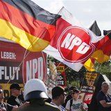 Far-right National Democratic Party (NPD) supporters protest against a refugee asylum in the Hellersdorf district of Berlin, in this August Far-right National Democratic Party (NPD) supporters protest against a refugee asylum in the Hellersdorf district of Berlin, in this August