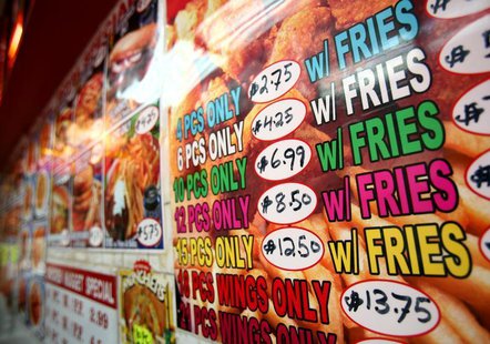 A menu for fried chicken and french fries is displayed on a wall at a fast food restaurant in New York, October 30, 2006. REUTERS/Shannon St A menu for fried chicken and french fries is displayed on a wall at a fast food restaurant in New York, October 30, 2006. REUTERS/Shannon St