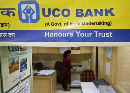 A staff member works inside a commercial branch of the UCO Bank in Mumbai June 1, 2013. REUTERS/Vivek Prakash A staff member works inside a commercial branch of the UCO Bank in Mumbai June 1, 2013. REUTERS/Vivek Prakash