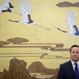 Britain's Prime Minister David Cameron stands before a painting before a signing ceremony at the Great Hall of the People in Beijing Decembe Britain's Prime Minister David Cameron stands before a painting before a signing ceremony at the Great Hall of the People in Beijing Decembe