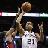 Dec 2, 2013; San Antonio, TX, USA; San Antonio Spurs forward Tim Duncan (21) drives to the basket as Atlanta Hawks forward Paul Millsap (lef Dec 2, 2013; San Antonio, TX, USA; San Antonio Spurs forward Tim Duncan (21) drives to the basket as Atlanta Hawks forward Paul Millsap (lef