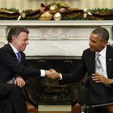 U.S. President Barack Obama shakes hands with Colombian President Juan Manuel Santos during their meeting in the Oval Office of the White Ho U.S. President Barack Obama shakes hands with Colombian President Juan Manuel Santos during their meeting in the Oval Office of the White Ho