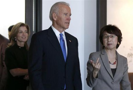 U.S. Vice President Joe Biden (C) and U.S. Ambassador to Japan Caroline Kennedy (L) inspect the headquarters of internet commerce and mobile games provider DeNA Co with the company's founder Tomoko Namba in Tokyo December 3, 2013.
CREDIT: REUTERS/TORU HANAI U.S. Vice President Joe Biden (C) and U.S. Ambassador to Japan Caroline Kennedy (L) inspect the headquarters of internet commerce and mobile games provider DeNA Co with the company's founder Tomoko Namba in Tokyo December 3, 2013.
CREDIT: REUTERS/TORU HANAI