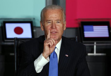 U.S. Vice President Joe Biden (L) gestures as he speaks to Japanese business leaders during their meeting at the headquarters of internet co U.S. Vice President Joe Biden (L) gestures as he speaks to Japanese business leaders during their meeting at the headquarters of internet co