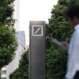 Men walk past a logo of Deutsche Bank AG in Tokyo September 9, 2013. REUTERS/Toru Hanai Men walk past a logo of Deutsche Bank AG in Tokyo September 9, 2013. REUTERS/Toru Hanai
