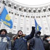People gather in front of the Ukrainian cabinet of ministers building during a rally to support EU integration in Kiev December 4, 2013. REU People gather in front of the Ukrainian cabinet of ministers building during a rally to support EU integration in Kiev December 4, 2013. REU
