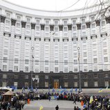 People gather in front of the Ukrainian cabinet of ministers building during a rally to support EU integration in Kiev December 4, 2013. REU People gather in front of the Ukrainian cabinet of ministers building during a rally to support EU integration in Kiev December 4, 2013. REU