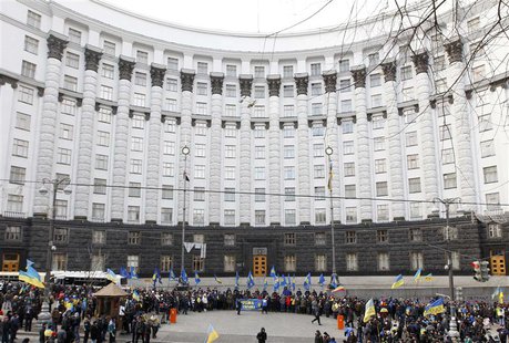 People gather in front of the Ukrainian cabinet of ministers building during a rally to support EU integration in Kiev December 4, 2013. REU People gather in front of the Ukrainian cabinet of ministers building during a rally to support EU integration in Kiev December 4, 2013. REU