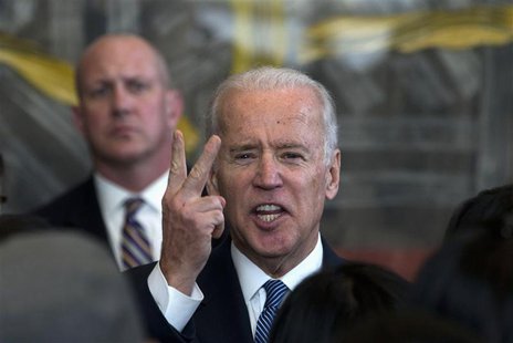 U.S. Vice President Joe Biden speaks as he meets visa applicants at the U.S. Embassy Consular Section in Beijing December 4, 2013. REUTERS/N U.S. Vice President Joe Biden speaks as he meets visa applicants at the U.S. Embassy Consular Section in Beijing December 4, 2013. REUTERS/N