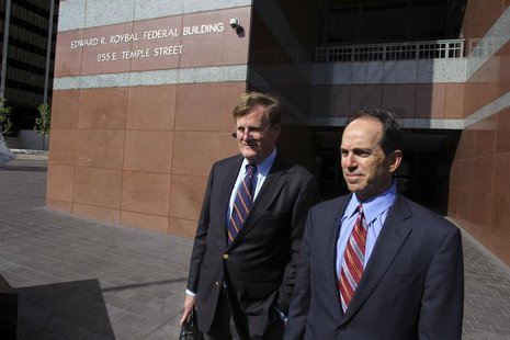 Former KPMG senior auditor Scott London (R) and his lawyer Harland Braun leave the Roybal Federal Court Building after London's hearing in d Former KPMG senior auditor Scott London (R) and his lawyer Harland Braun leave the Roybal Federal Court Building after London's hearing in d