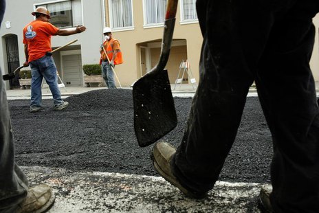 Workers spread asphalt on a street in the Cow Hollow neighborhood in San Francisco, California June 2, 2010. REUTERS/Robert Galbraith Workers spread asphalt on a street in the Cow Hollow neighborhood in San Francisco, California June 2, 2010. REUTERS/Robert Galbraith