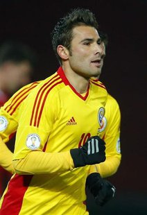 Adrian Mutu of Romania celebrates his penalty goal against Hungary during their 2014 World Cup Group D qualifying soccer match in Budapest M Adrian Mutu of Romania celebrates his penalty goal against Hungary during their 2014 World Cup Group D qualifying soccer match in Budapest M