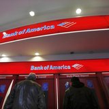 Customers use ATMs at a Bank of America banking center in New York's financial district January 17, 2013. REUTERS/Brendan McDermid Customers use ATMs at a Bank of America banking center in New York's financial district January 17, 2013. REUTERS/Brendan McDermid