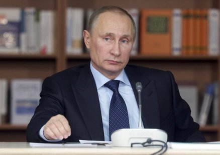 Russian President Vladimir Putin attends a meeting with academics at the Moscow State University December 3, 2013. REUTERS/Mikhail Metzel/RI Russian President Vladimir Putin attends a meeting with academics at the Moscow State University December 3, 2013. REUTERS/Mikhail Metzel/RI