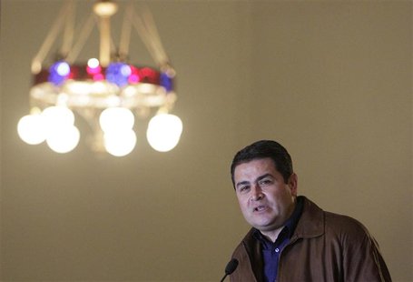 Honduras' President-elect Juan Hernandez addresses members of the congregation after attending Mass at the Basilica of Suyapa in Tegucigalpa Honduras' President-elect Juan Hernandez addresses members of the congregation after attending Mass at the Basilica of Suyapa in Tegucigalpa