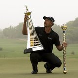 Henrik Stenson of Sweden poses with his trophies after winning the DP World Tour Championship in Dubai November 17, 2013. REUTERS/Caren Firo Henrik Stenson of Sweden poses with his trophies after winning the DP World Tour Championship in Dubai November 17, 2013. REUTERS/Caren Firo