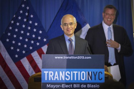 Anthony Shorris reacts after being teased about his height during the announcement by New York Mayor elect Bill de Blasio (R) that Shorris w Anthony Shorris reacts after being teased about his height during the announcement by New York Mayor elect Bill de Blasio (R) that Shorris w