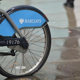 A man walks past a rental bicycle sponsored by Barclays in London July 30, 2013. REUTERS/Toby Melville A man walks past a rental bicycle sponsored by Barclays in London July 30, 2013. REUTERS/Toby Melville