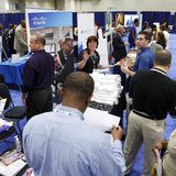 Jobseekers talk with recruiters at a Hire Our Heroes job fair targeting unemployed military veterans and sponsored by the Cable Show, a cabl Jobseekers talk with recruiters at a Hire Our Heroes job fair targeting unemployed military veterans and sponsored by the Cable Show, a cabl