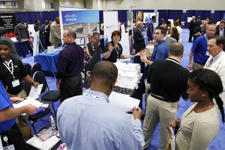 Jobseekers talk with recruiters at a Hire Our Heroes job fair targeting unemployed military veterans and sponsored by the Cable Show, a cabl Jobseekers talk with recruiters at a Hire Our Heroes job fair targeting unemployed military veterans and sponsored by the Cable Show, a cabl