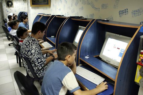 Young Lebanese surf the net at an Internet cafe in Beirut in this picture taken September 7, 2005. Young Lebanese surf the net at an Internet cafe in Beirut in this picture taken September 7, 2005.