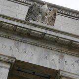 An eagle tops the U.S. Federal Reserve building's facade in Washington, July 31, 2013. REUTERS/Jonathan Ernst An eagle tops the U.S. Federal Reserve building's facade in Washington, July 31, 2013. REUTERS/Jonathan Ernst