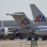 American Airlines airliners sit near a hanger at Dallas/Fort Worth International Airport, Texas April 4, 2012. REUTERS/Tim Sharp American Airlines airliners sit near a hanger at Dallas/Fort Worth International Airport, Texas April 4, 2012. REUTERS/Tim Sharp