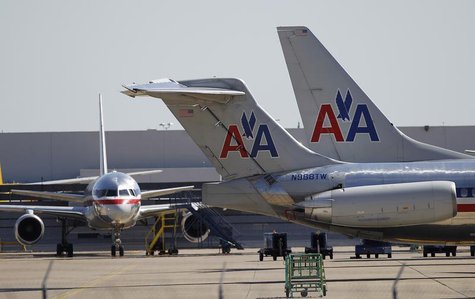 American Airlines airliners sit near a hanger at Dallas/Fort Worth International Airport, Texas April 4, 2012. REUTERS/Tim Sharp American Airlines airliners sit near a hanger at Dallas/Fort Worth International Airport, Texas April 4, 2012. REUTERS/Tim Sharp