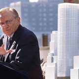 Developer Larry Silverstein speaks next to a model of the new 7 World Trade Center tower during an unveiling of the plans in New York, in th Developer Larry Silverstein speaks next to a model of the new 7 World Trade Center tower during an unveiling of the plans in New York, in th