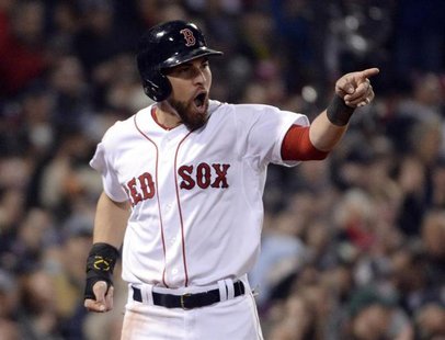 Oct 30, 2013; Boston, MA, USA; Boston Red Sox center fielder Jacoby Ellsbury reacts after scoring a run against the St. Louis Cardinals in t Oct 30, 2013; Boston, MA, USA; Boston Red Sox center fielder Jacoby Ellsbury reacts after scoring a run against the St. Louis Cardinals in t