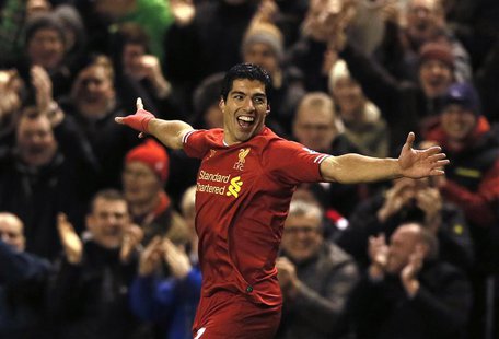 Liverpool's Luis Suarez celebrates scoring a goal against Norwich during their English Premier League soccer match at Anfield in Liverpool, Liverpool's Luis Suarez celebrates scoring a goal against Norwich during their English Premier League soccer match at Anfield in Liverpool,