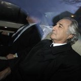 Bernard Madoff (R), who confessed to defrauding investors of 50 billion dollars, arrives home after a hearing at Federal Court, in New York, Bernard Madoff (R), who confessed to defrauding investors of 50 billion dollars, arrives home after a hearing at Federal Court, in New York,