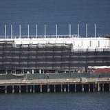 A barge built with four levels of shipping containers is seen at Pier 1 at Treasure Island in San Francisco, California October 28, 2013. Ho A barge built with four levels of shipping containers is seen at Pier 1 at Treasure Island in San Francisco, California October 28, 2013. Ho
