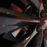 A logo of Tesla Motor Inc is seen on the wheel of its Model S car, on display at the 43rd Tokyo Motor Show November 20, 2013. REUTERS/Yuya S A logo of Tesla Motor Inc is seen on the wheel of its Model S car, on display at the 43rd Tokyo Motor Show November 20, 2013. REUTERS/Yuya S
