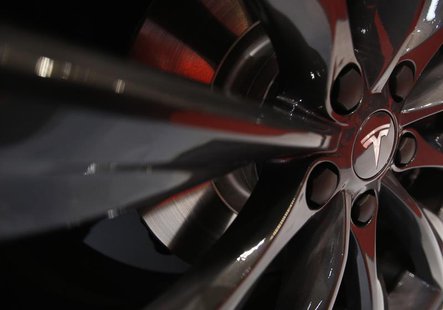 A logo of Tesla Motor Inc is seen on the wheel of its Model S car, on display at the 43rd Tokyo Motor Show November 20, 2013. REUTERS/Yuya S A logo of Tesla Motor Inc is seen on the wheel of its Model S car, on display at the 43rd Tokyo Motor Show November 20, 2013. REUTERS/Yuya S
