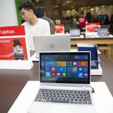 A man shops at a Microsoft store during Black Friday in San Francisco, California November 29, 2013. REUTERS/Stephen Lam A man shops at a Microsoft store during Black Friday in San Francisco, California November 29, 2013. REUTERS/Stephen Lam