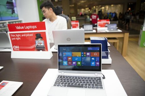 A man shops at a Microsoft store during Black Friday in San Francisco, California November 29, 2013. REUTERS/Stephen Lam A man shops at a Microsoft store during Black Friday in San Francisco, California November 29, 2013. REUTERS/Stephen Lam