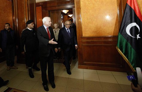 Libyan Prime Minister Ali Zeidan (R) and U.S. Senator John McCain (C) leave a meeting at the headquarters of the Prime Minister's Office in Libyan Prime Minister Ali Zeidan (R) and U.S. Senator John McCain (C) leave a meeting at the headquarters of the Prime Minister's Office in