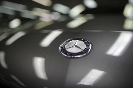 A company logo is seen on a Mercedes-Benz A-class car displayed in a dealership of German car manufacturer Daimler in Paris, July 30, 2013. A company logo is seen on a Mercedes-Benz A-class car displayed in a dealership of German car manufacturer Daimler in Paris, July 30, 2013.