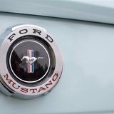 A Mustang badge is seen on Gail Wise's Skylight Blue 1964 1/2 Ford Mustang in Park Ridge, Illinois November 26, 2013. REUTERS/John Gress A Mustang badge is seen on Gail Wise's Skylight Blue 1964 1/2 Ford Mustang in Park Ridge, Illinois November 26, 2013. REUTERS/John Gress
