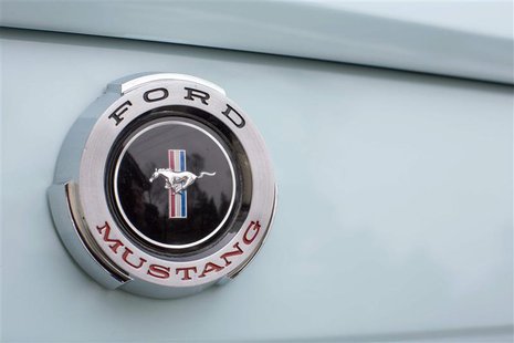 A Mustang badge is seen on Gail Wise's Skylight Blue 1964 1/2 Ford Mustang in Park Ridge, Illinois November 26, 2013. REUTERS/John Gress A Mustang badge is seen on Gail Wise's Skylight Blue 1964 1/2 Ford Mustang in Park Ridge, Illinois November 26, 2013. REUTERS/John Gress