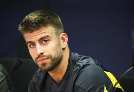 Barcelona's Gerard Pique attends a news conference after a training session at Ciutat Esportiva Joan Gamper in Sant Joan Despi near Barcelon Barcelona's Gerard Pique attends a news conference after a training session at Ciutat Esportiva Joan Gamper in Sant Joan Despi near Barcelon