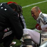 Bayern Munich's Arjen Robben reacts as medical assistants attend to his leg during the team's third round German soccer cup (DFB-Pokal) matc Bayern Munich's Arjen Robben reacts as medical assistants attend to his leg during the team's third round German soccer cup (DFB-Pokal) matc