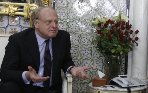 Paolo Scaroni, chief executive officer of Italian energy company ENI, speaks with Tunisian Prime Minister Ali Larayedh (not pictured) in Tun Paolo Scaroni, chief executive officer of Italian energy company ENI, speaks with Tunisian Prime Minister Ali Larayedh (not pictured) in Tun